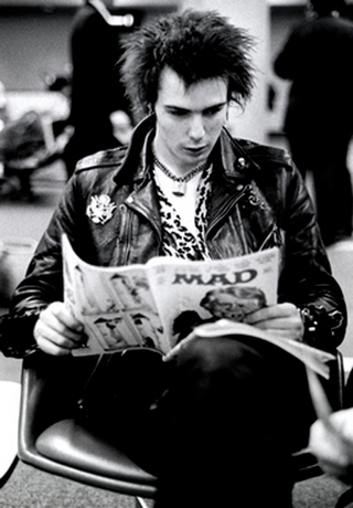 Illustration for article titled Just Some Ordinary People Reading MAD